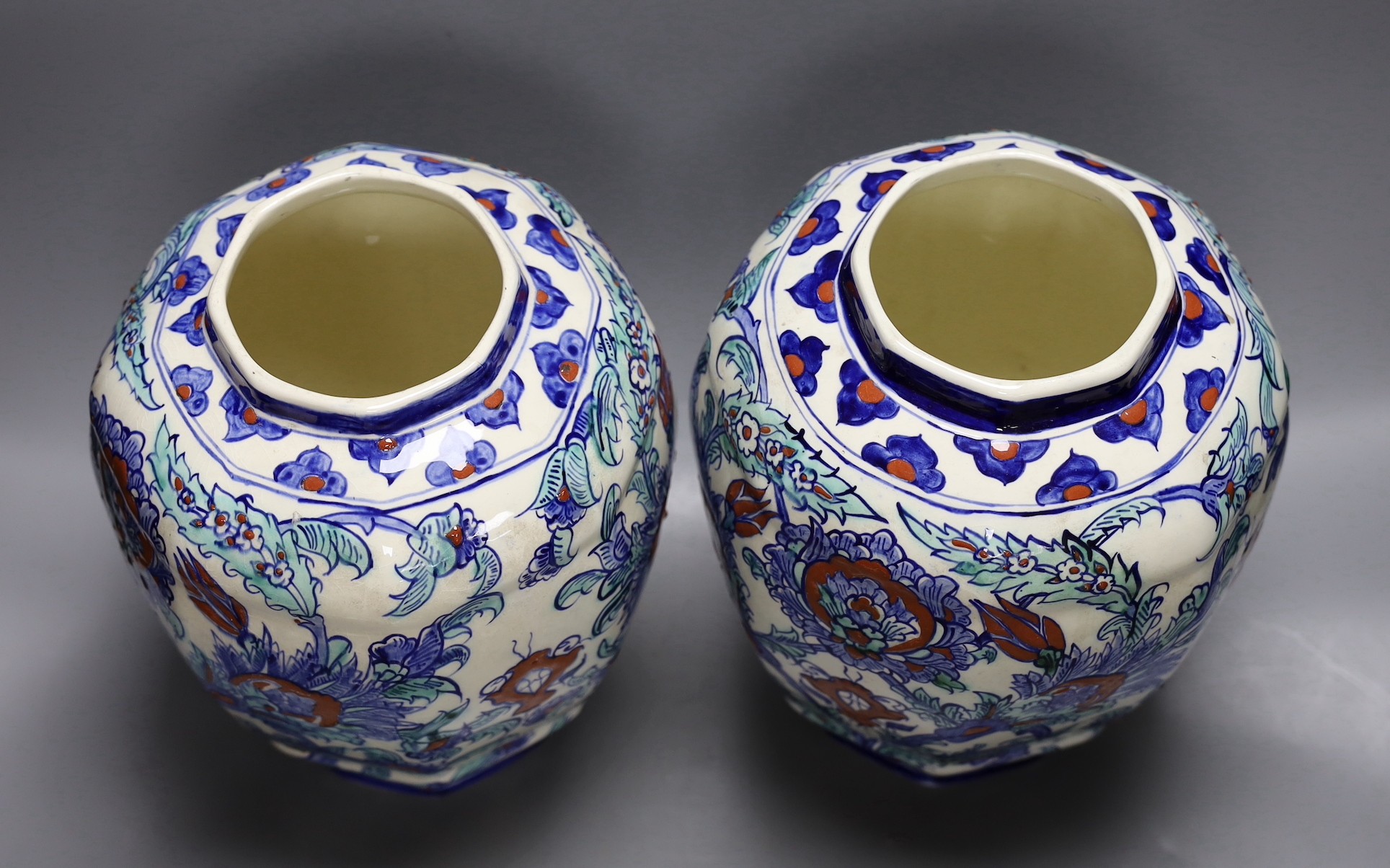 A pair of Belgian keramis jars and covers, 41cm